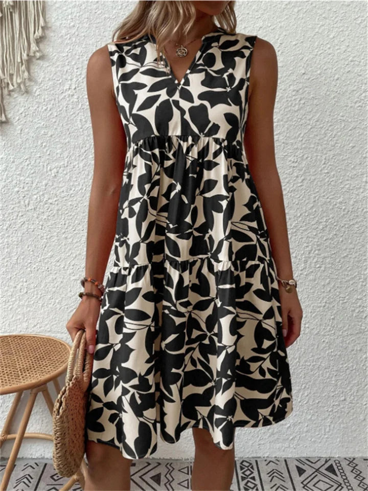 TASHA | FLARED MIDI DRESS WITH A FLOWING SILHOUETTE